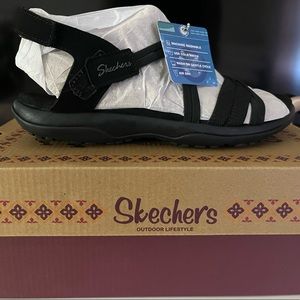 Black skecher sandals